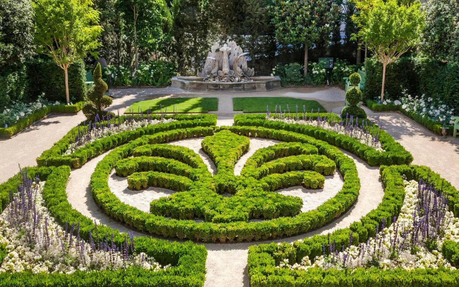 Formal garden with intricate hedges and fountain at Caumont Centre d’Art, Aix-en-Provence.