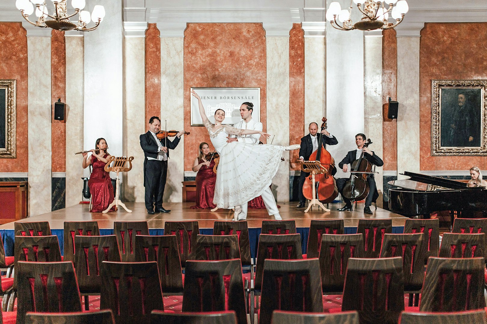 Vienna Residence Orchestra performing with dancers at Old Stock Exchange Palace.