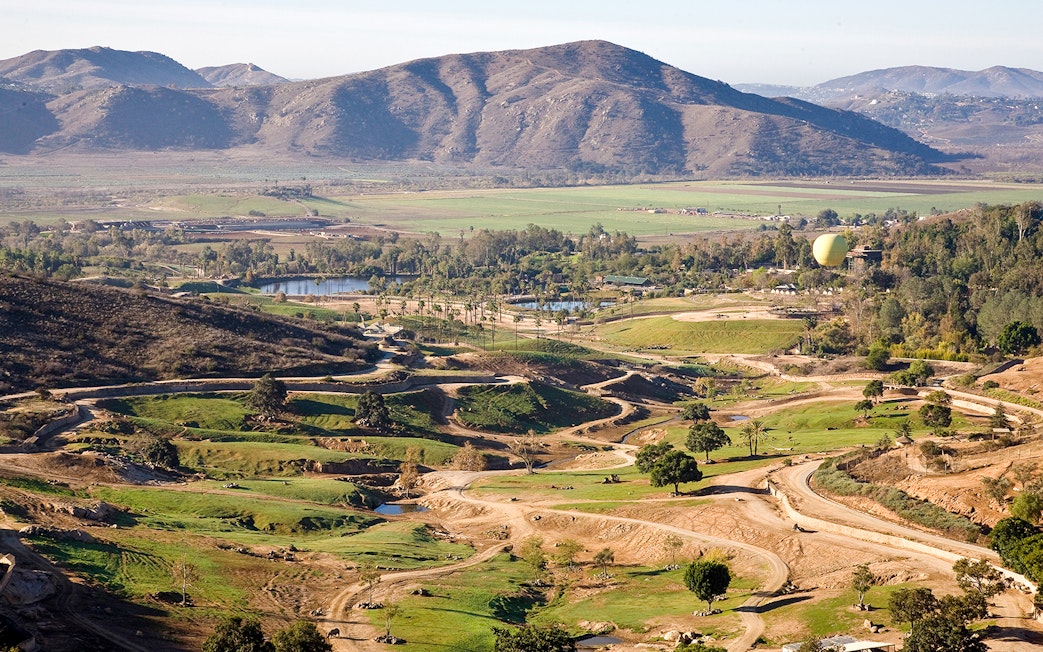 San Diego Zoo Safari Park landscape with Africa Tram paths and distant mountains.