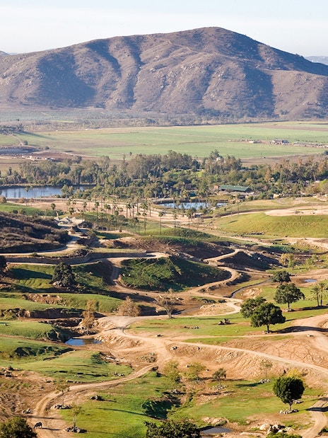 San Diego Zoo Safari Park landscape with Africa Tram paths and distant mountains.