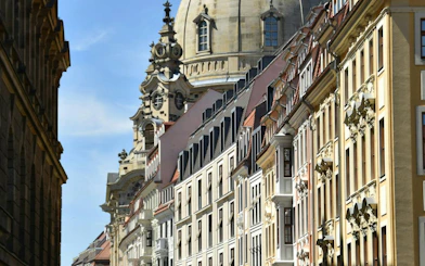 Dresden Frauenkirche dome and historic buildings on a sunny day, Dresden city exploration.
