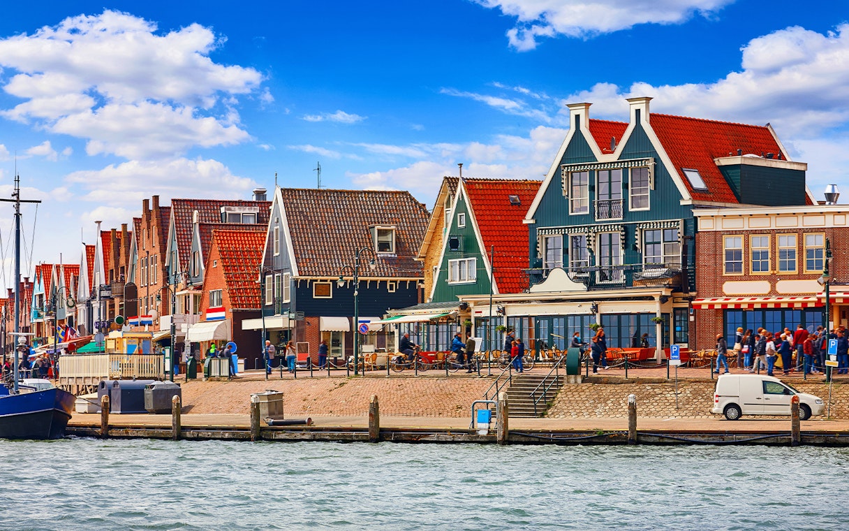 Colorful Dutch houses along the waterfront in Volendam, Netherlands.