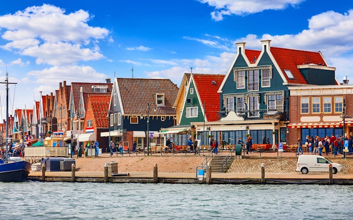 Colorful Dutch houses along the waterfront in Volendam, Netherlands.