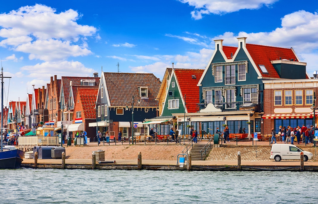 Colorful Dutch houses along the waterfront in Volendam, Netherlands.