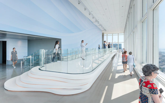 Visitors enjoying panoramic views from an observation deck in Boston.