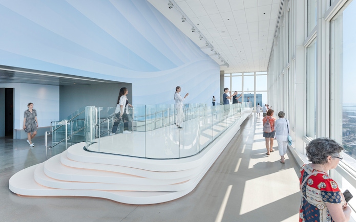 Visitors enjoying panoramic views from an observation deck in Boston.