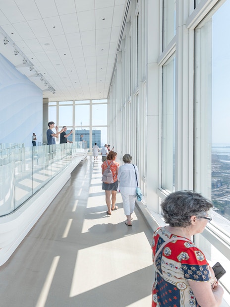 Visitors enjoying panoramic views from an observation deck in Boston.