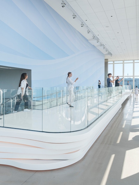 Visitors enjoying panoramic views from an observation deck in Boston.