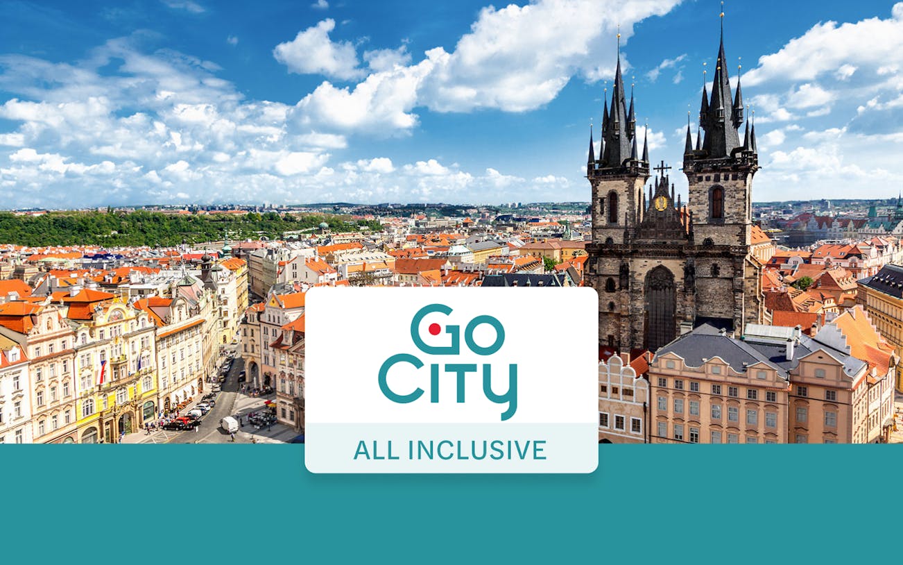 Old Town Square in Prague with Tyn Church and historic buildings.