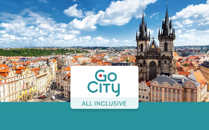 Old Town Square in Prague with Tyn Church and historic buildings.