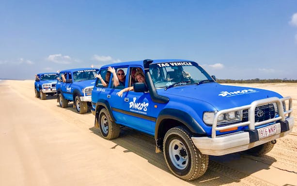 Four-wheel drive tour on K'gari beach, Fraser Island.