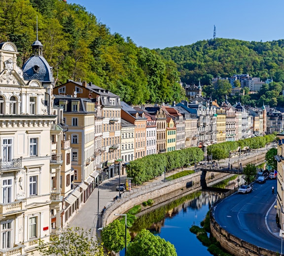 Historic buildings along the river in the old quarter of Karlovy Vary, Czech Republic.
