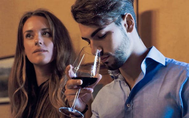 Man tasting wine during VIP Semi-Private Super Tuscan Wine Tour masterclass.