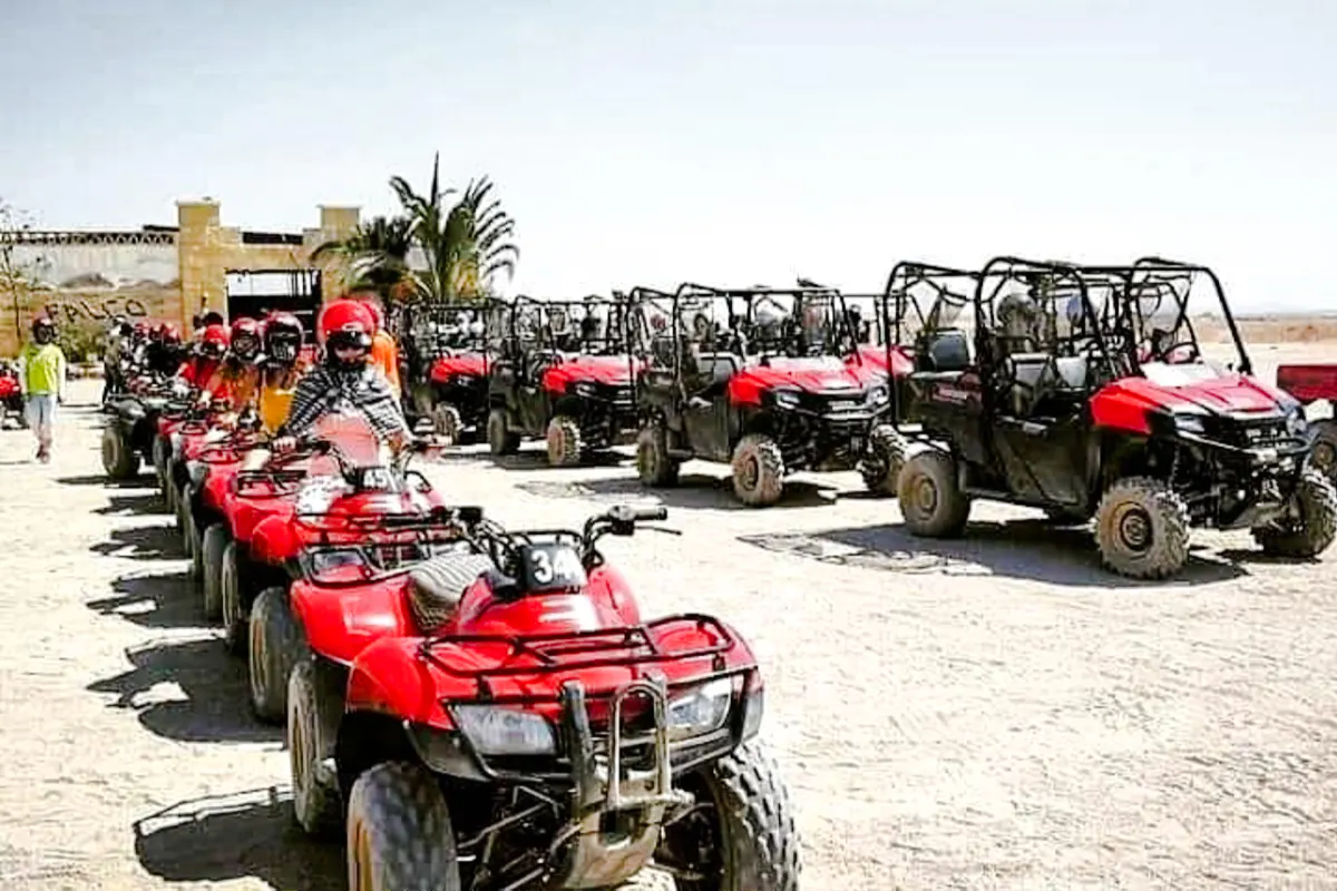 Quad bikes and buggies lined up for a family safari trip in Hurghada.