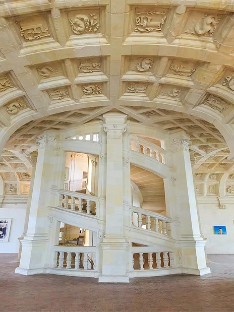 Chambord Castle's double helix staircase in Loire Valley, France.