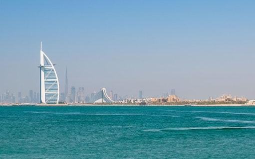 Burj Al Arab and Dubai skyline viewed from the sea, related to Jet Car Dubai tour.