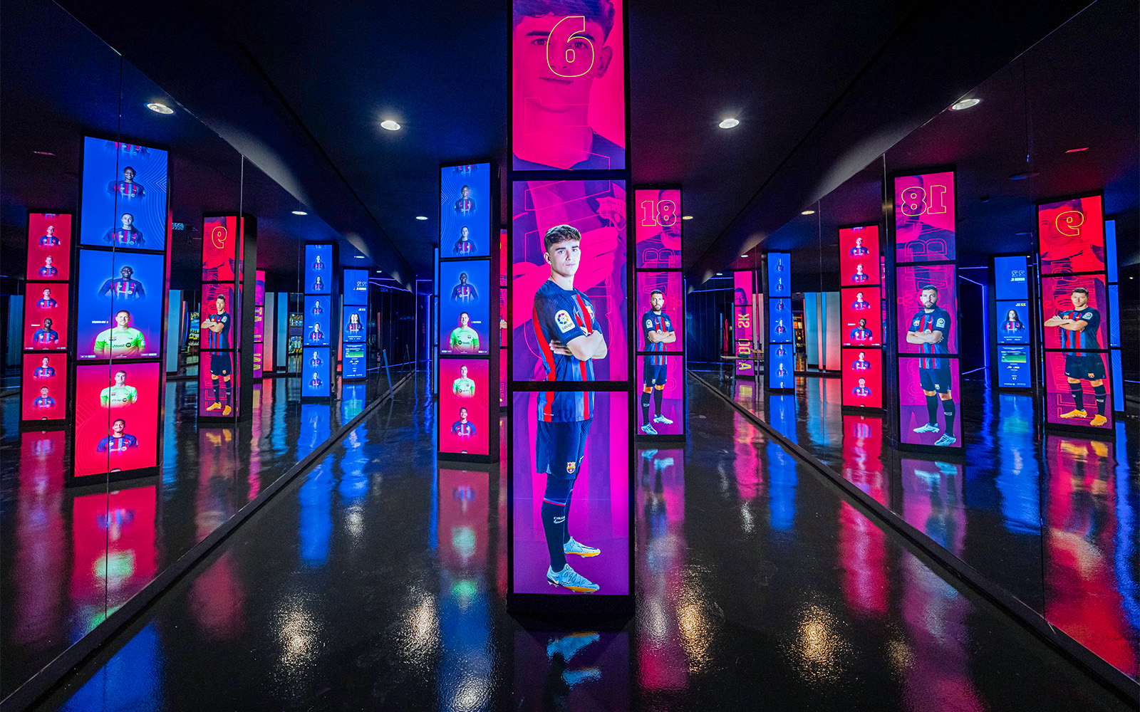 Camp Nou stadium interior with FC Barcelona Museum exhibits and memorabilia.