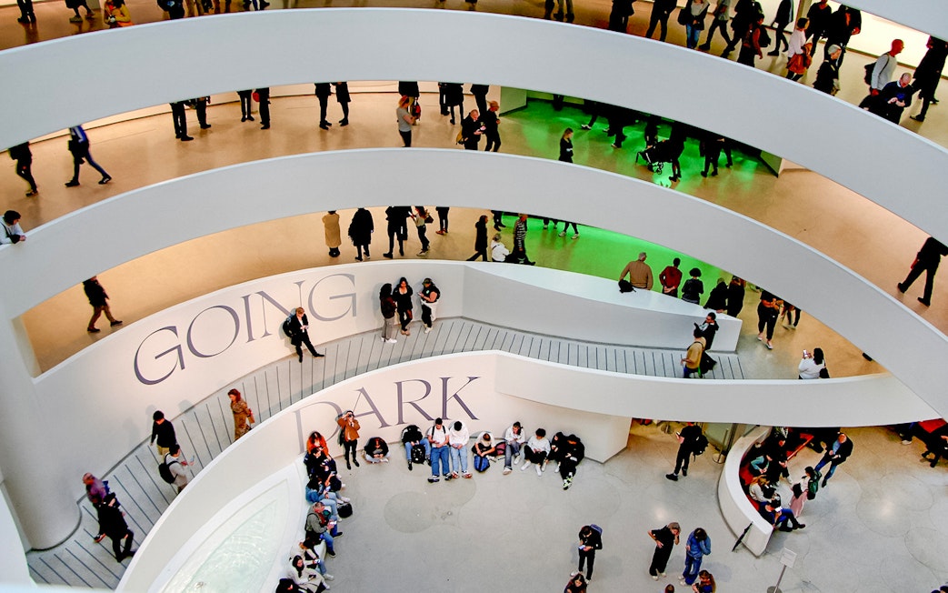 Visitors inside the Guggenheim Museum's spiral walkway, New York City.
