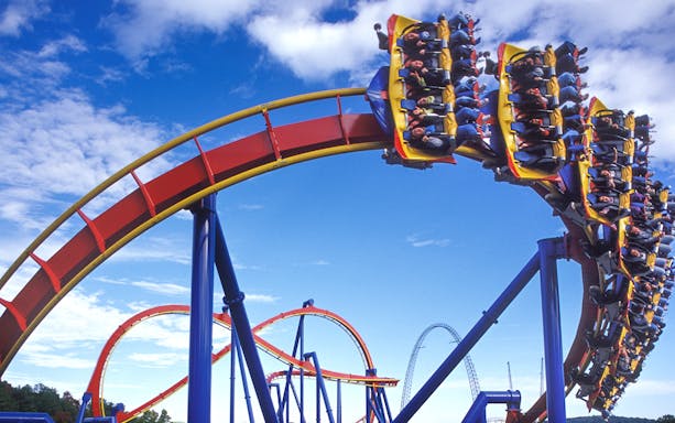 Roller coaster loop with riders at Six Flags Great Adventure, New Jersey.