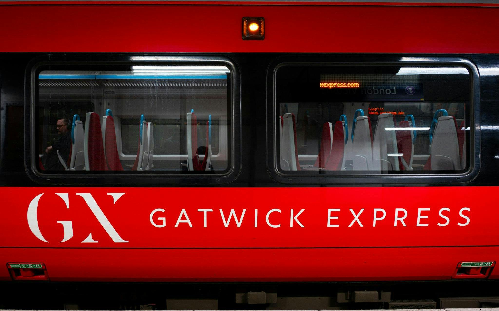 Gatwick Express train at station for Gatwick Airport day travel.
