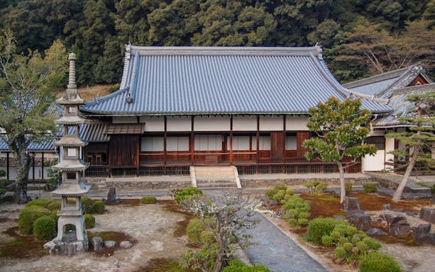 Monk practicing Zazen meditation inside Kosho-ji Temple, Kyoto.