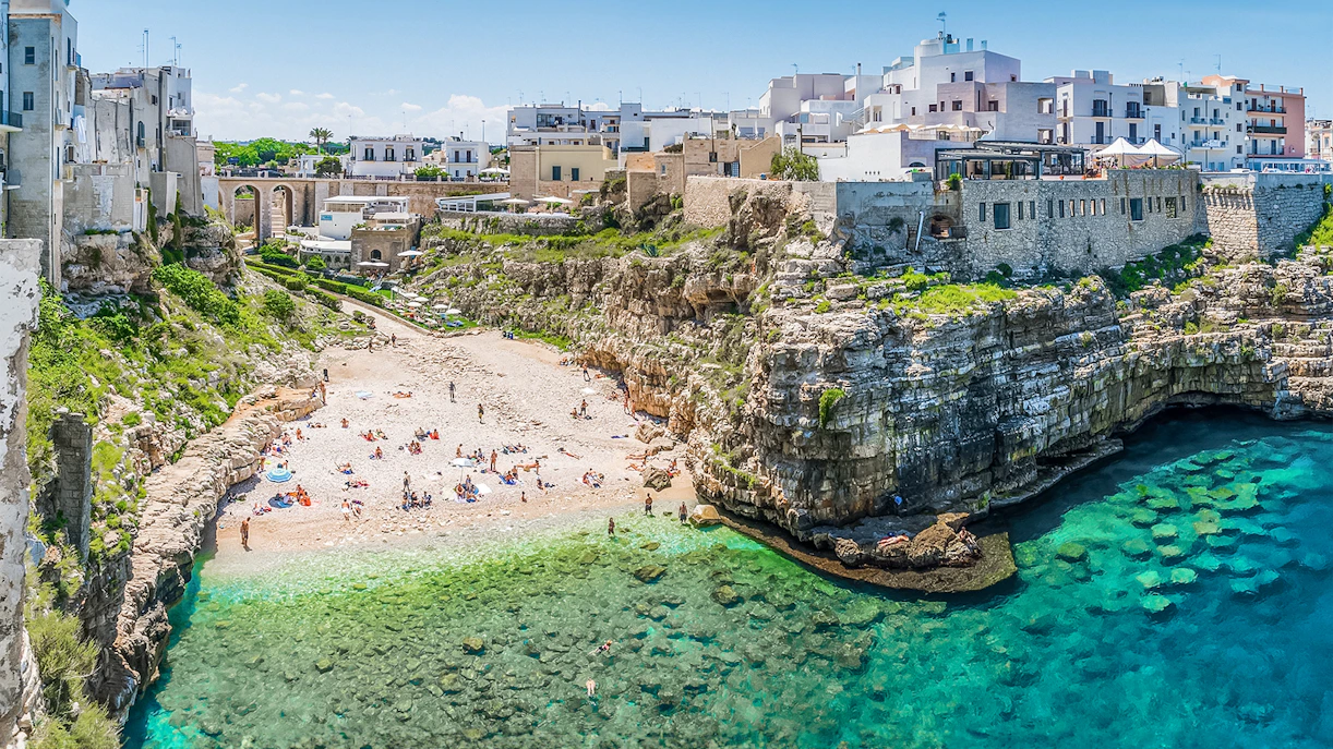 Beach and cliffs in Polignano a Mare, Bari province, Puglia, Italy.