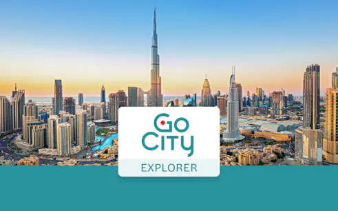 Dubai skyline with Burj Khalifa at sunset, promoting Go City: Dubai Explorer Pass.