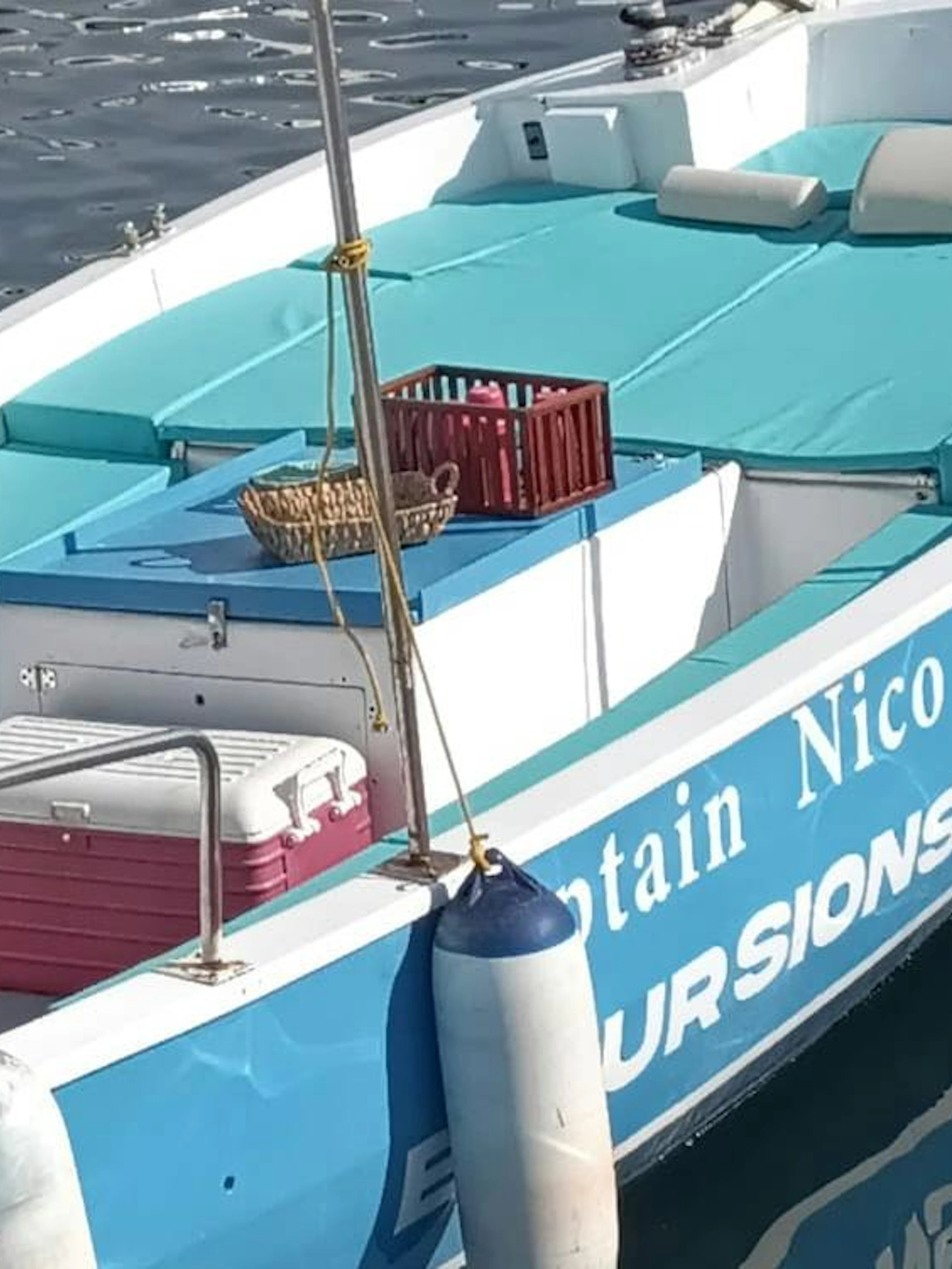 Boat prepared for Naples Posillipo Coast tour with snorkeling gear and Neapolitan tasting setup.