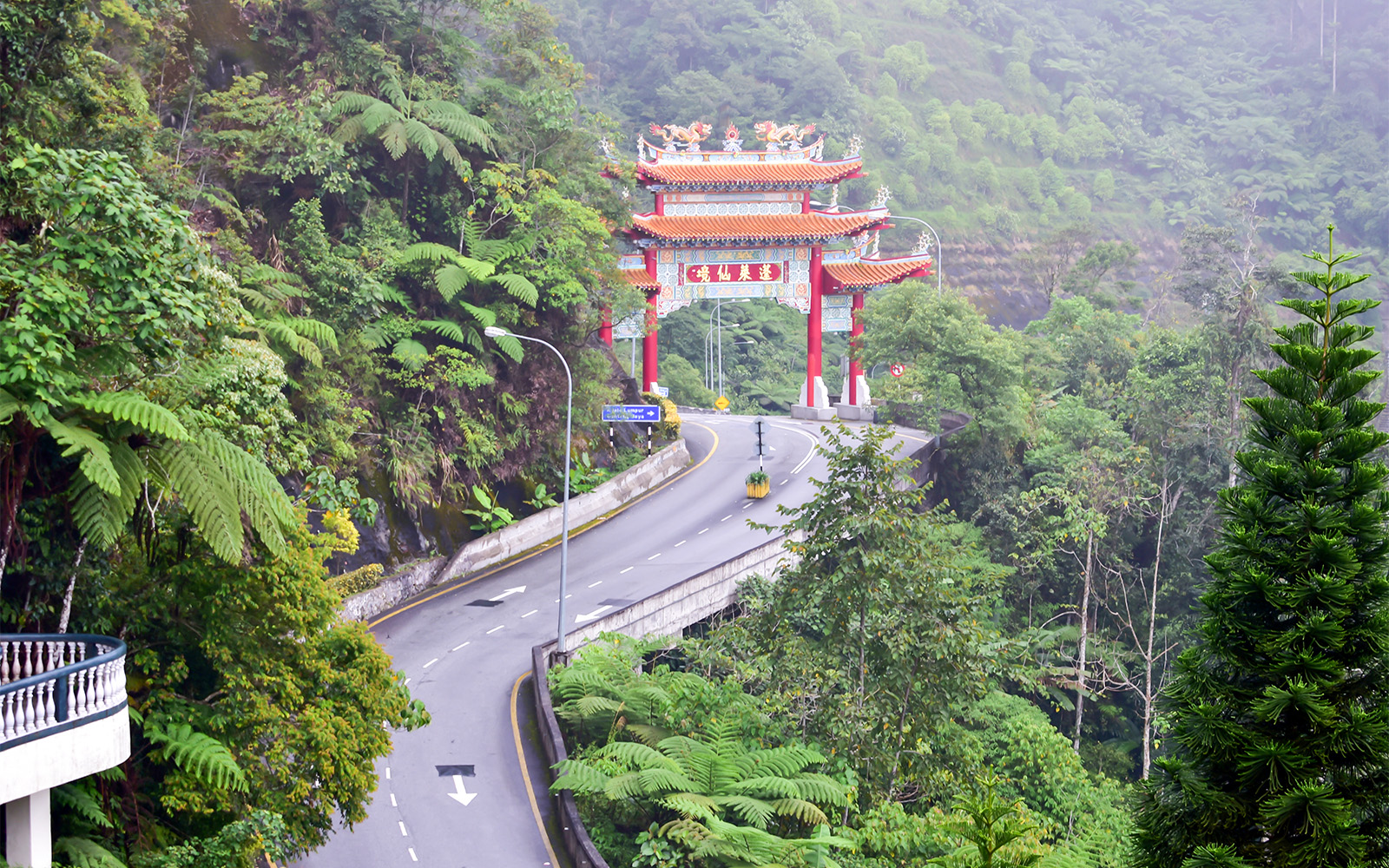 Chin Swee Caves Temple with intricate pagoda and lush forest backdrop in Genting Highlands, Malaysia.