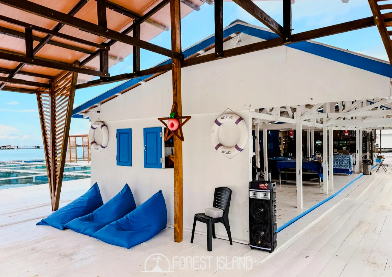 Catamaran deck with seating and decor, Penang Forest Island Cruise.
