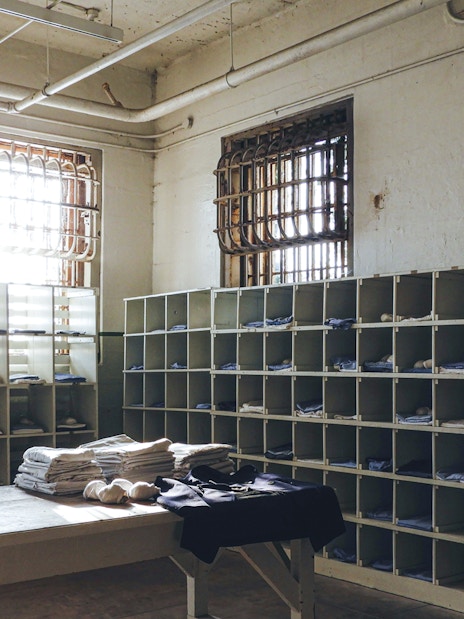 Alcatraz prison laundry room with shelves and barred windows in San Francisco.