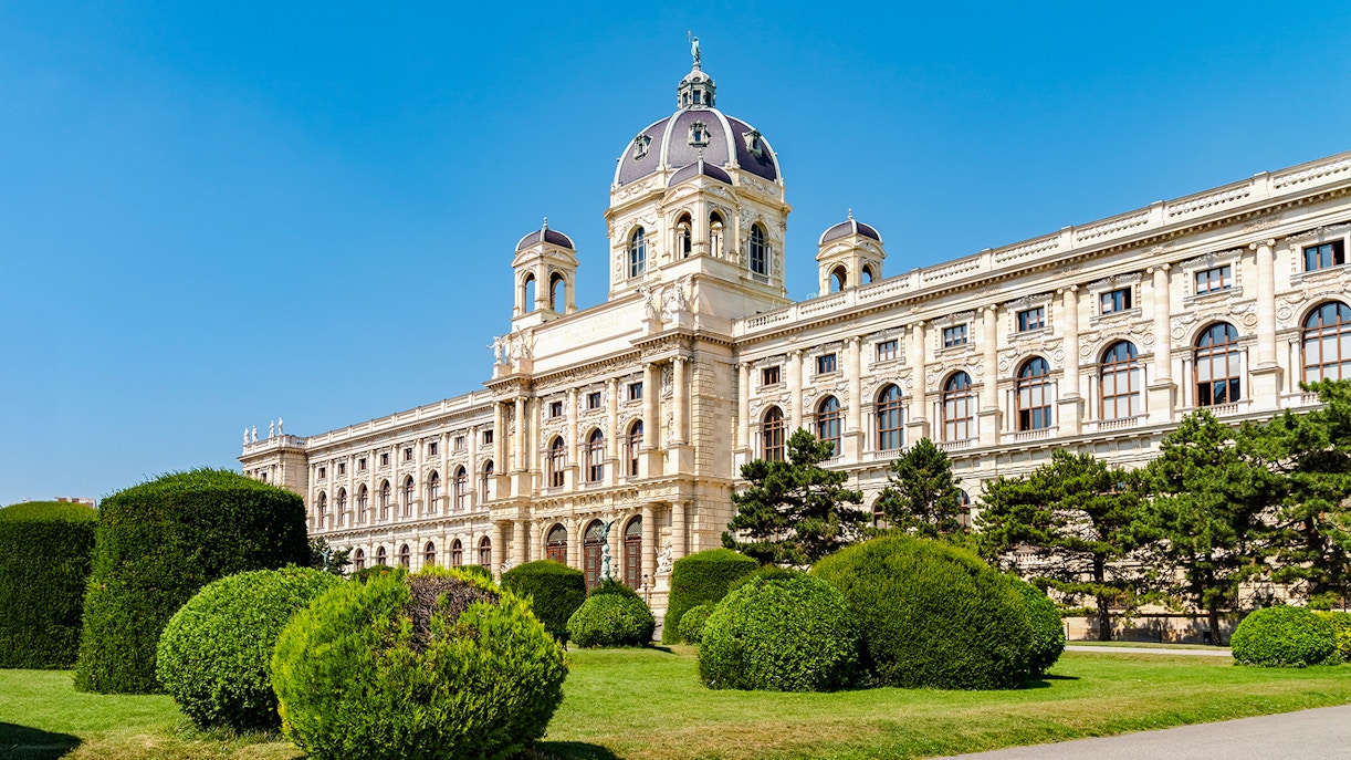 Natural History Museum Vienna exterior with grand architecture and visitors exploring the entrance.