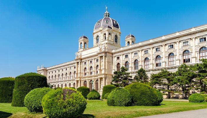 Natural History Museum Vienna exterior with grand architecture and visitors exploring the entrance.
