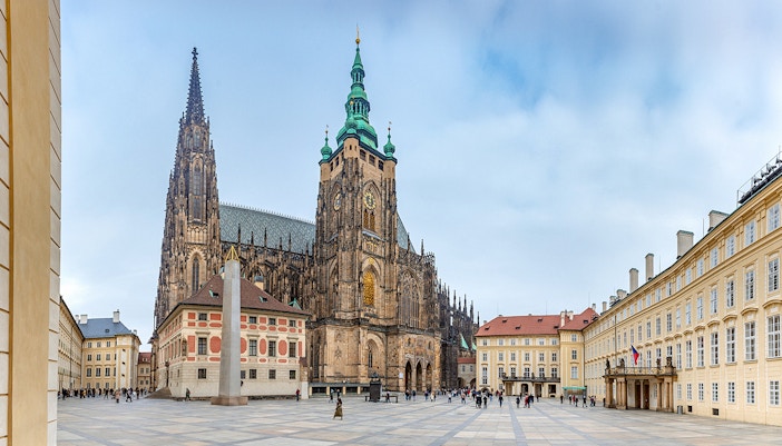 Prague Castle guided tour with visitors exploring historic architecture, Czech Republic.