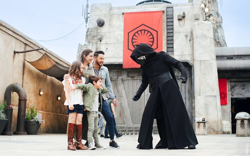 Guests interacting with a Star Wars character at Disneyland Park, California.