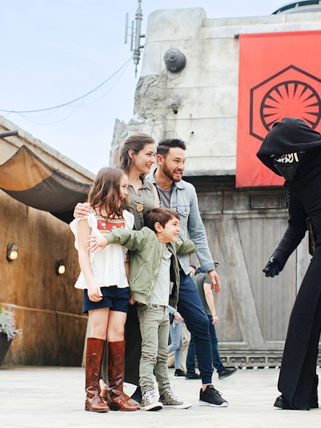 Guests interacting with a Star Wars character at Disneyland Park, California.