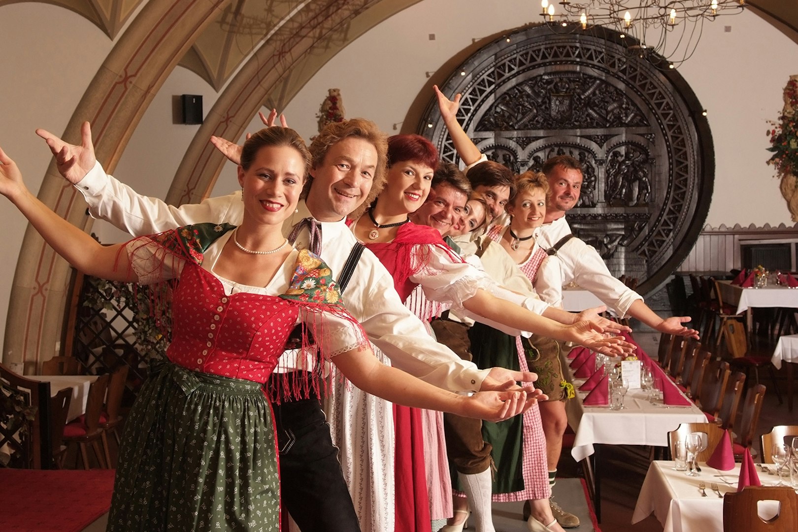 Performers in traditional attire at Waltz- & Operetta Dinner Show, Vienna city hall restaurant.