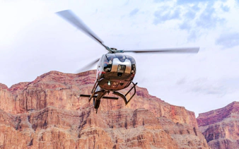 Helicopter flying over Grand Canyon West during Las Vegas tour.