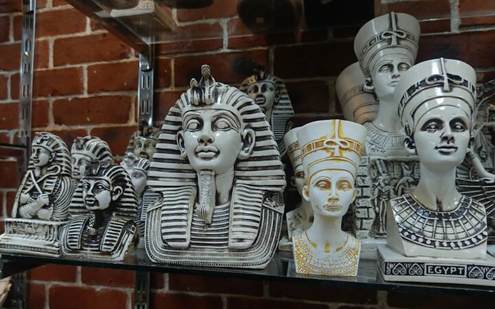 Ancient Egyptian pharaoh and queen busts on display in a Hurghada shop.