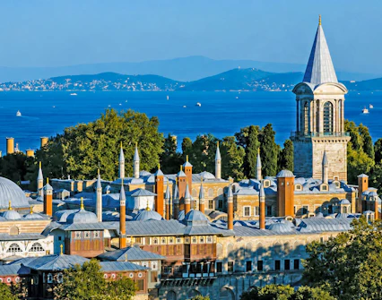 Topkapi Palace with Bosphorus view in Istanbul, showcasing historic architecture and scenic landscape.