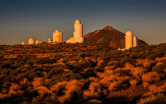 Observatory domes at Izaña Atmospheric Observatory with Mount Teide in the background, Tenerife.