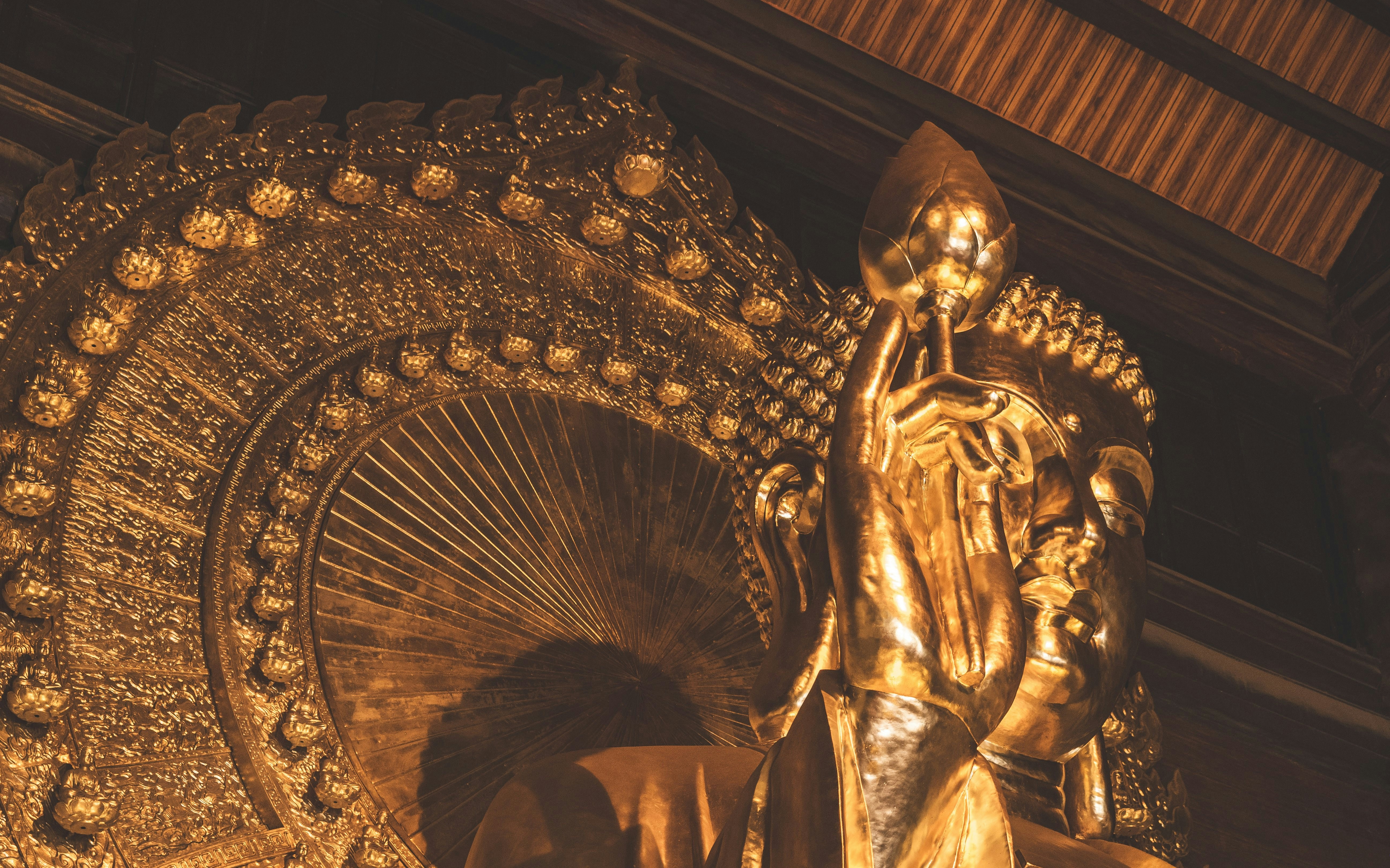 Golden Buddha statue detail at Bai Dinh pagoda, Ninh Binh, Vietnam.