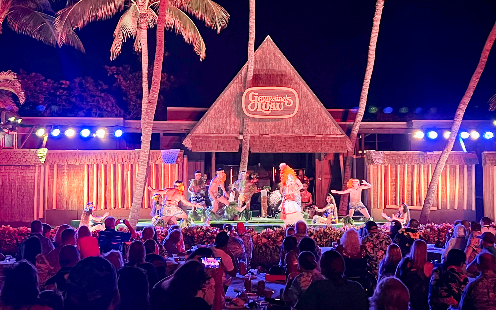 Dancers performing on stage at Germaine's Luau in Hawaii.