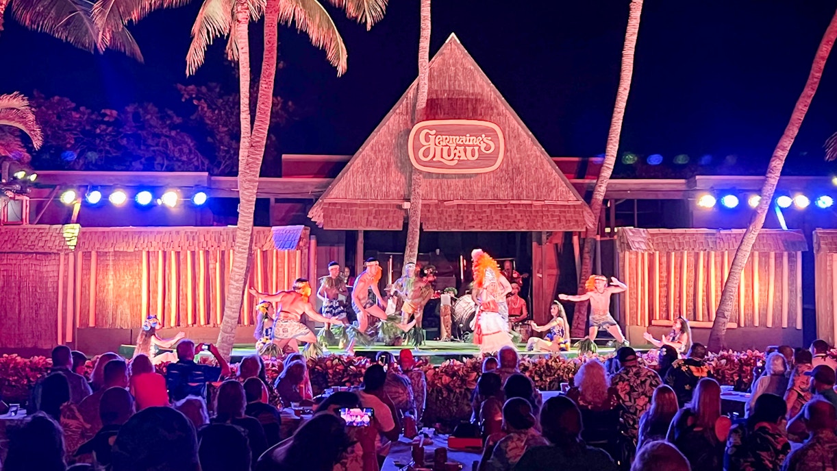 Dancers performing traditional Hawaiian hula on stage at Germaine's Luau, Oahu.