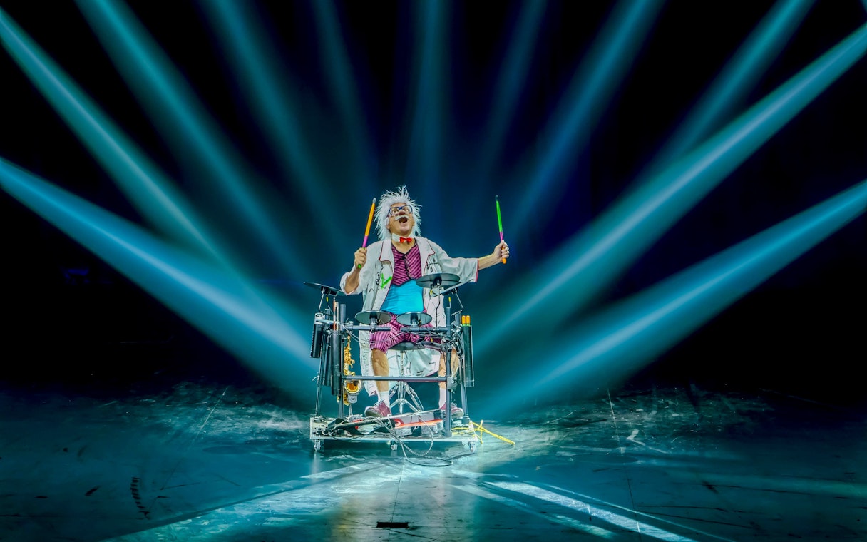 Drummer performing under spotlights at Aqua Circus Phuket.