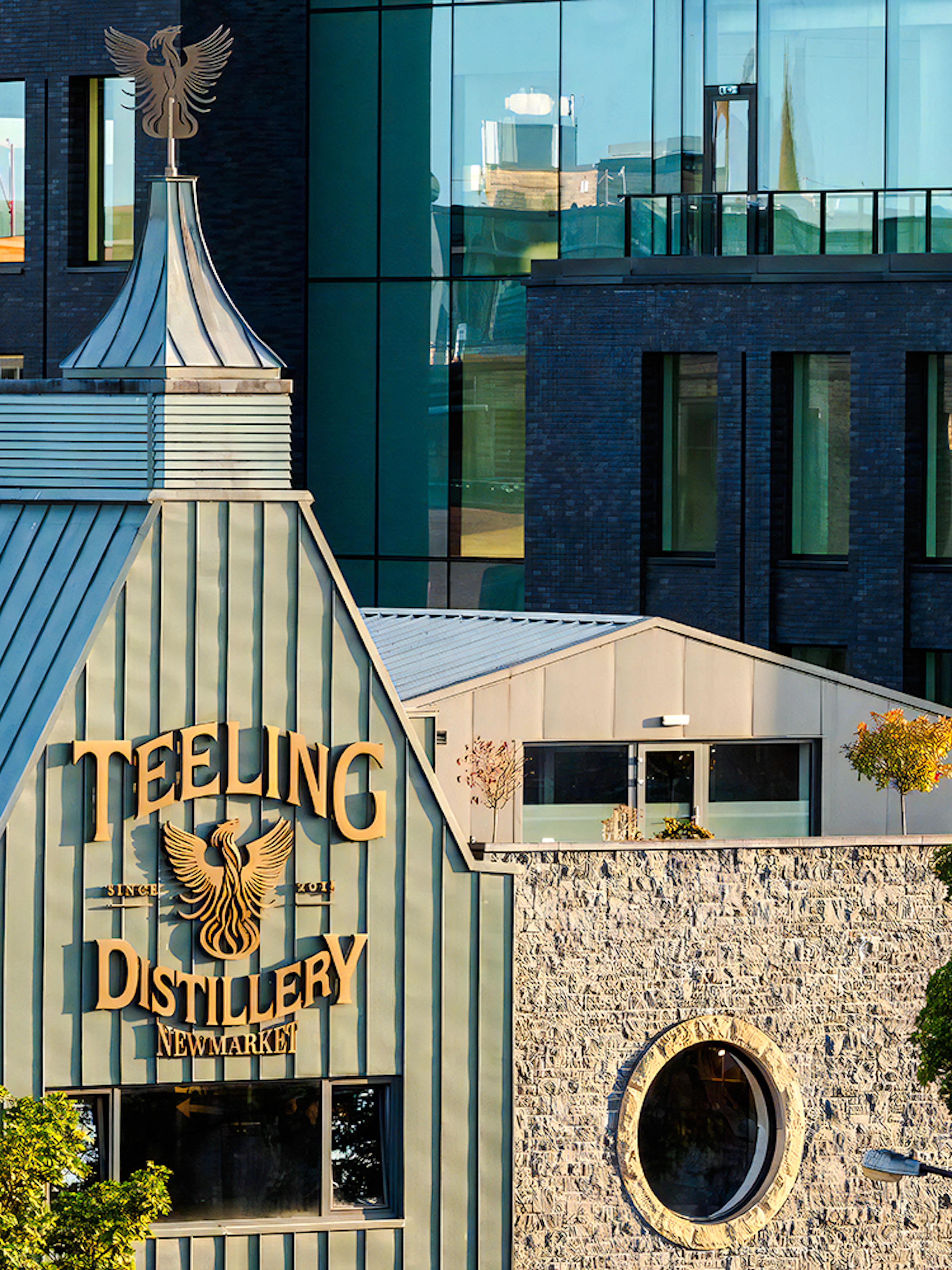 Teeling Whiskey Distillery exterior with stone facade and modern glass windows in Dublin.