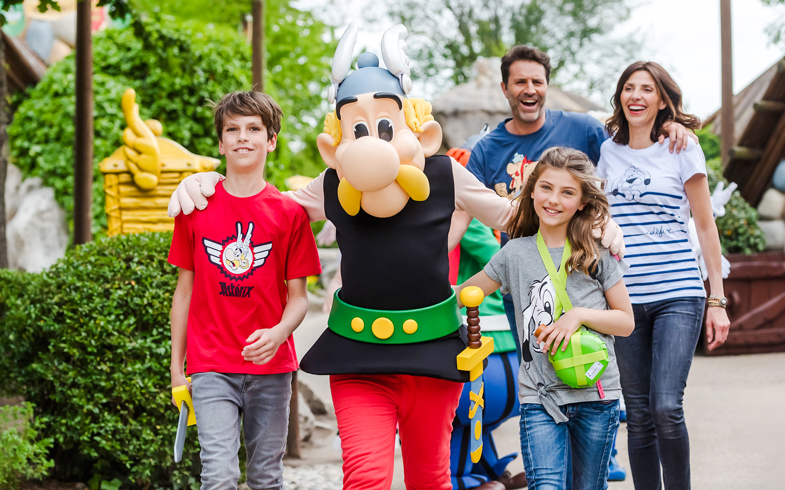 Visitors enjoying a walk with Asterix character at Asterix Park.