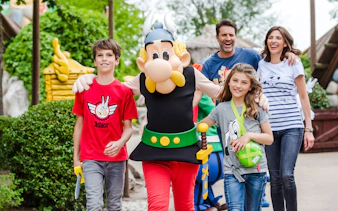 Visitors enjoying a walk with Asterix character at Asterix Park.