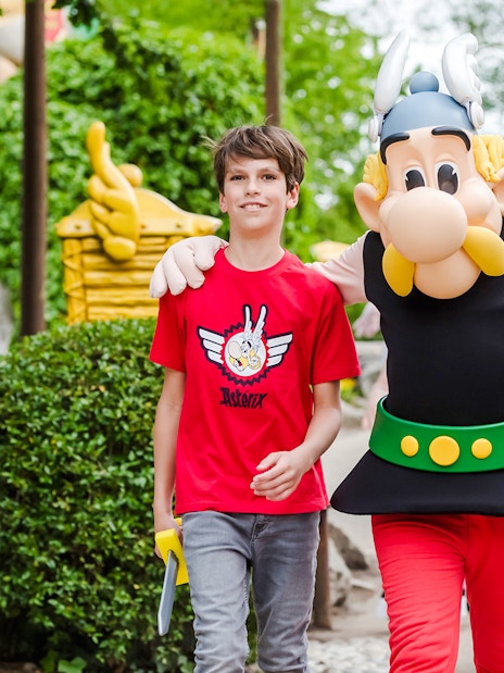 Visitors enjoying a walk with Asterix character at Asterix Park.
