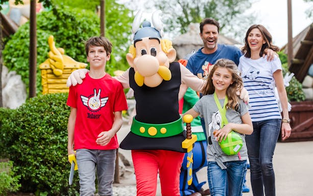 Visitors enjoying a walk with Asterix character at Asterix Park.